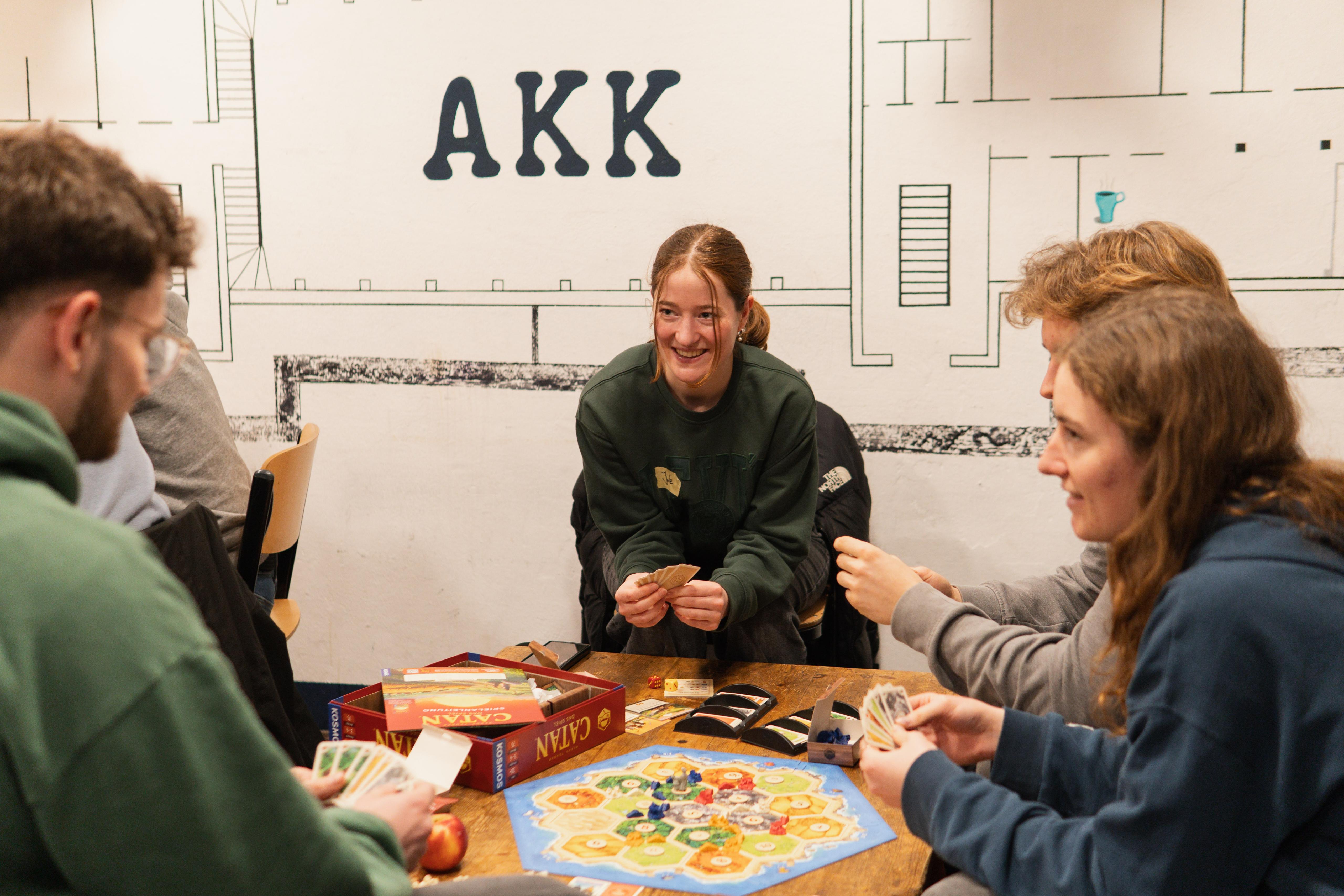Leute spielen Catan